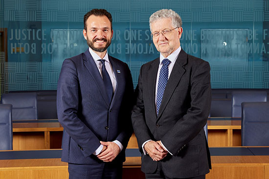 Photo of Lord Hodge & President of the European Court of Human Rights Judge RÃ³bert Ragnar SpanÃ³ in Courtroom 2 